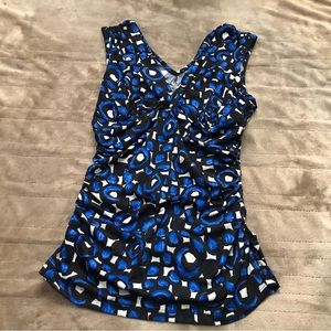 Sleeveless blue, black and white INC blouse. Size small.
